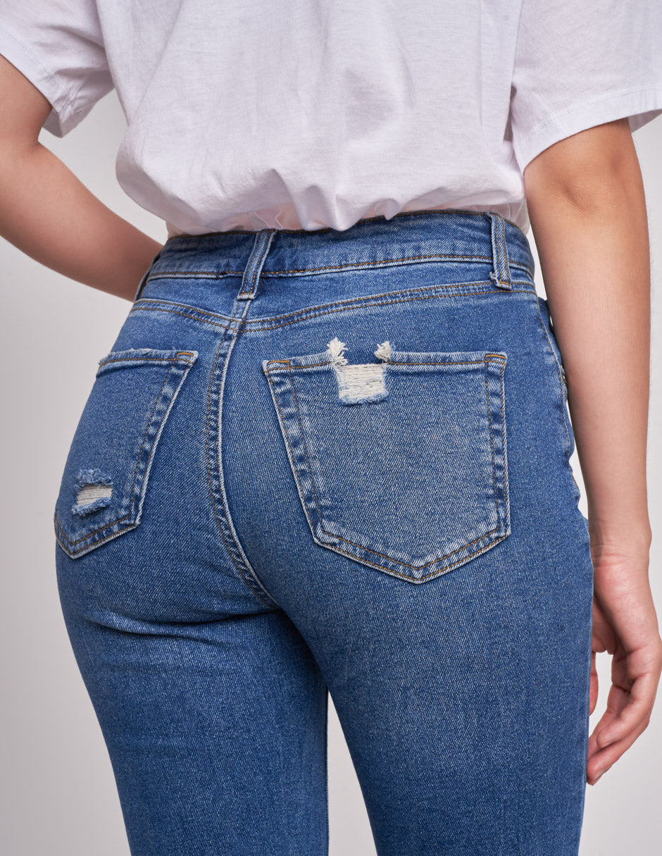 Pantalón Jeans Tiro Alto: Desgaste y Stretch para Estilo Slim